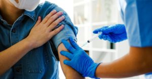 Scientists Challenge Health Officials on Vaccinating People Who Already Had COVID