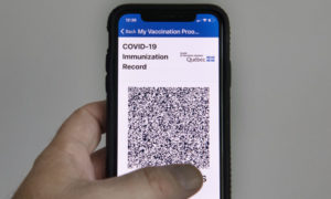 COVID-19 Vaccine Passports Will Be Imposed on UK This Month: Minister