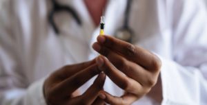 Arizona plan would make employers liable for complications from COVID shots