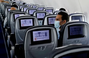 Can ‘one-way masking’ really protect you from COVID on a crowded plane?